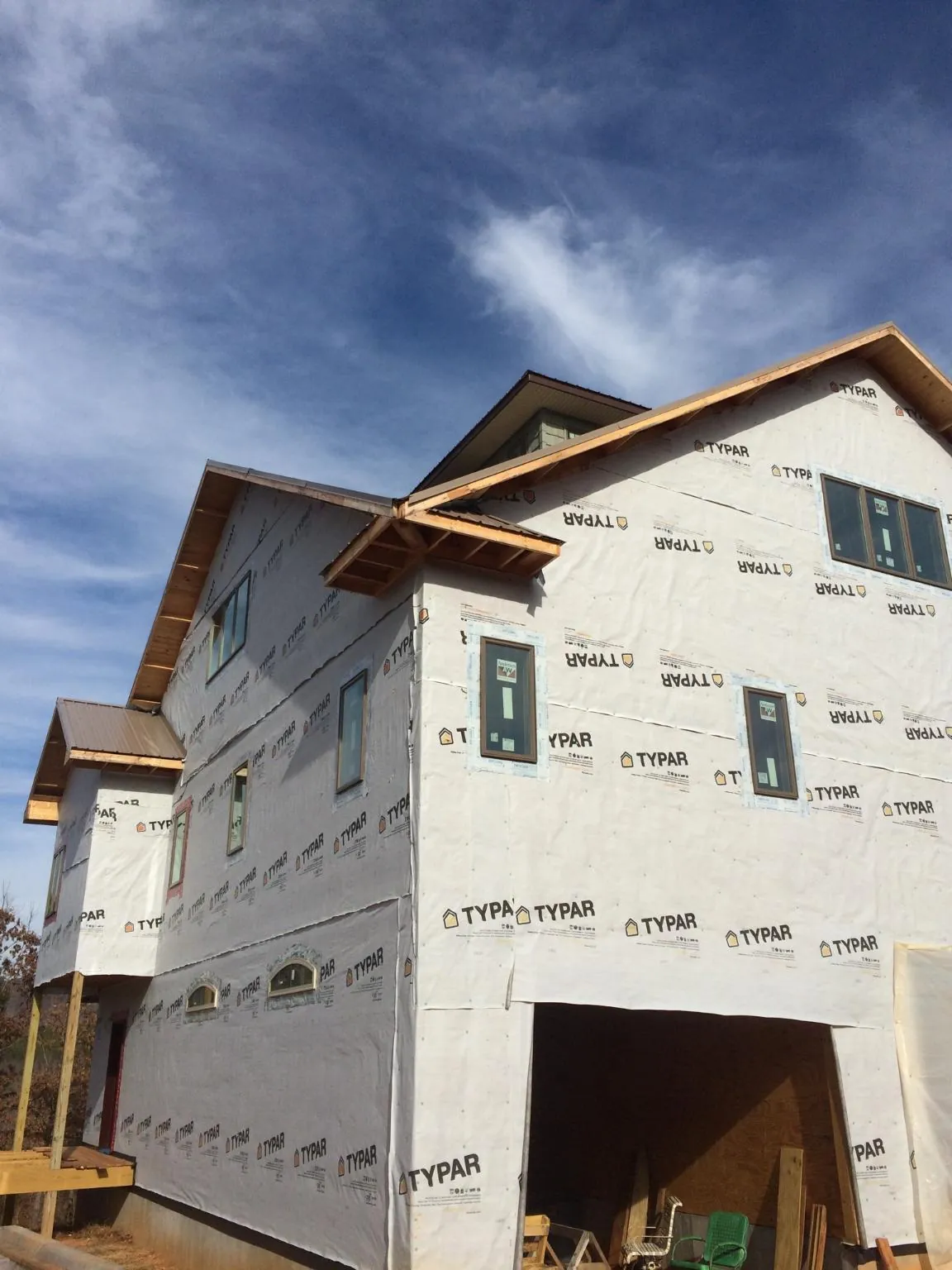 Stick built house wrapped in Typar with new roof framing and dormers in Gratiot